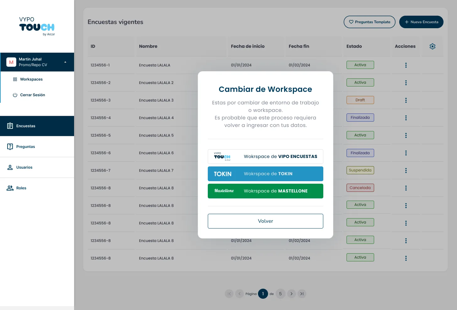 Workspace switch modal over the dashboard with three selectable company environments and a Back button